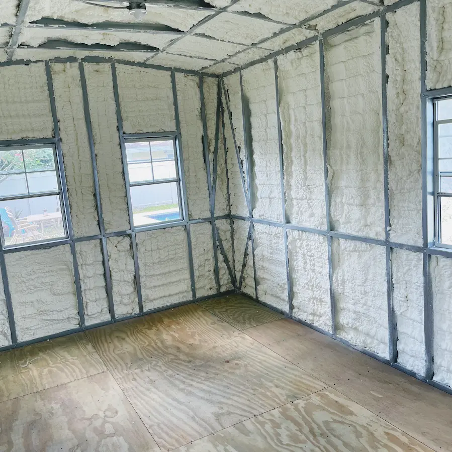 Closed-cell spray foam insulation applied to wall cavities in a residential project in Gaines